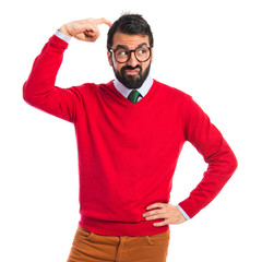 Hipster man thinking over white background