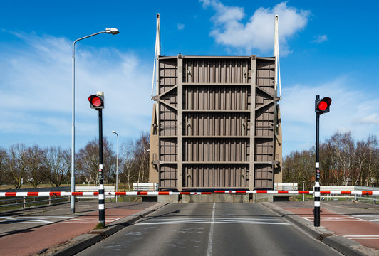 Fototapeta Opened drawbridge across a canal