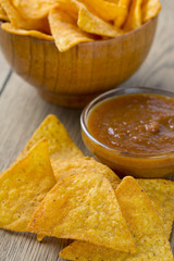 tortilla chips and tomato dip in a bowl