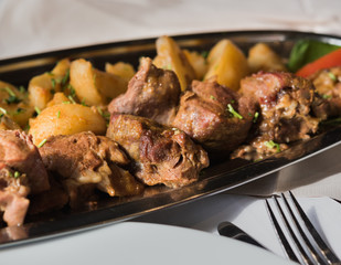 Baked meat with potato