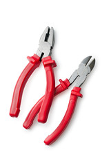 Pliers and wire cutters with red handles on a white background