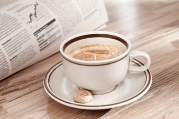 Coffee and morning newspaper