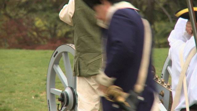 A canon fire during a revolutionary war battle reenactment