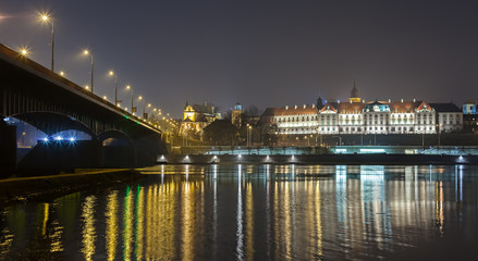 Fototapeta na wymiar Panoramic view of a Warsaw Vistula waterfront at night, Poland.