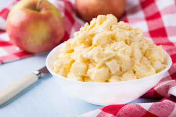 Apples with vanilla custard in a bowl