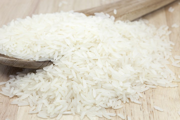 Thai jasmine Rice with wood background