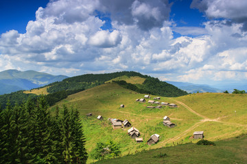 Barn for sheep on the meadow Menchul. Carpathians.