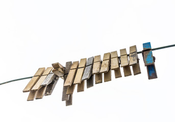 old clothespin under blue sky i