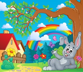 Obraz na płótnie Canvas Spring theme with bunny and rainbow