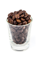 coffee beans in glass shot isolated on white background