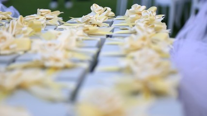 small wedding boxes with yellow ribbon
