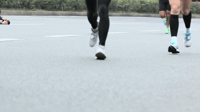 Unidentified marathon runners on the street at Shenzhen Internat