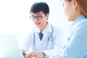 bright picture of male doctor with patient