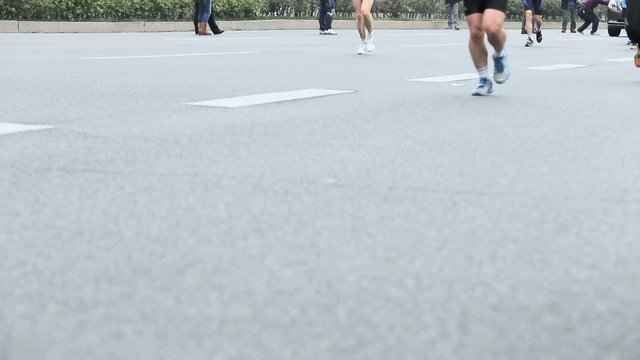 Unidentified marathon runners on the street at Shenzhen Internat