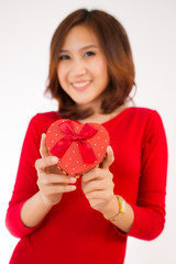 Woman hands holding a gift