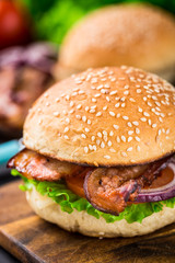 Home made burger on wooden board