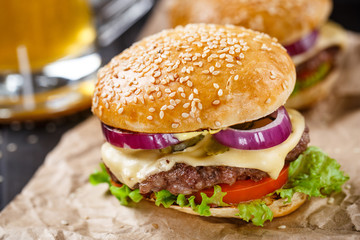 Delicious burger on wooden board
