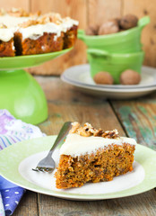 carrot cake with walnuts and cream