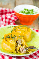 Carrot rolls of dough stuffed with meat