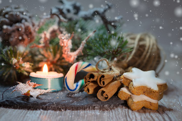 Christmas decorations with burning candle