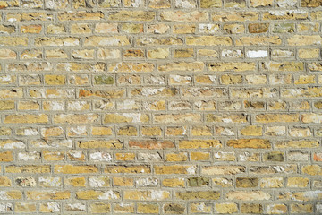 old bricks stone wall in various colors
