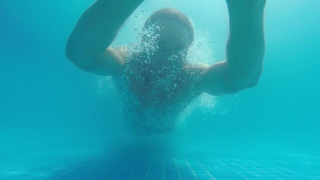Underwater dive in pool