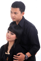 young asian couple in love on white background