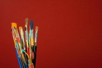 Arts painting brushes with red background