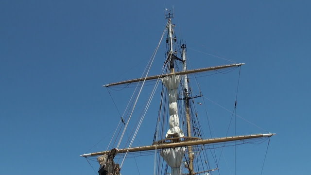 Two-masted sailing ship anchored in Papeete harbor