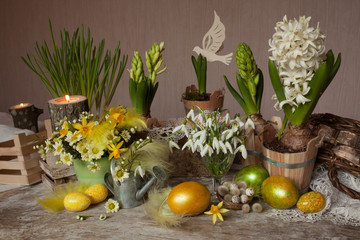 Spring flowers eggs on the table Easter