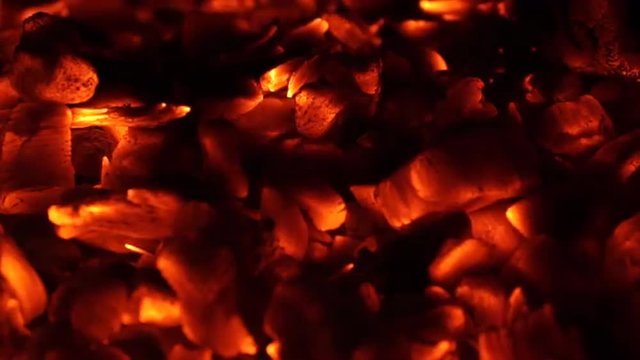 Flames and fiery coals filmed at 120fps.