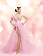 Woman Beauty Portrait in Pink Dress with Sakura Flower Asian