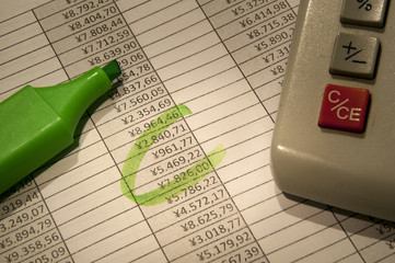 excel tax spreadsheet with green marker
