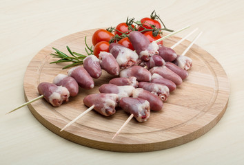 Raw chicken hearts for barbecue