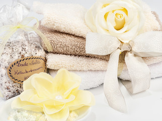 Obraz na płótnie Canvas Spa and wellness setting with soap, bath salts and towels