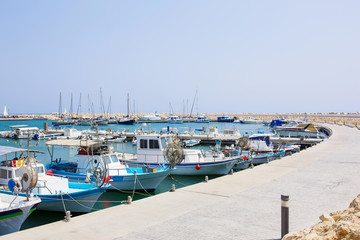 Yachts and boats in old port in Mediterranean sea