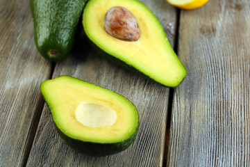 Avocado on wooden background