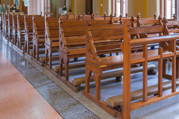 Walkway and Wood Bench of Catholic church, people can pray for g