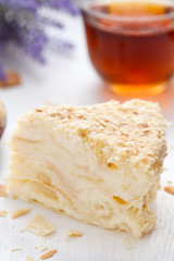 Custard slice cake in vintage provence style background with tea