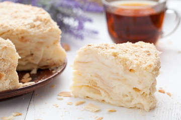 Mille-feuille cake in vintage provence style background with tea