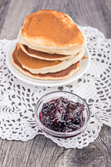 Fresh hot homemade pancakes slide and jam