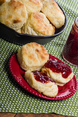 Fototapeta na wymiar Fresh baked biscuits and jam or preserves