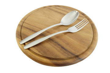 Silver spoons and chopping boards.