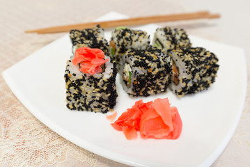  Sushi rolls,wasabi and ginger on  plate