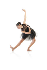 Young alternative ballerina dancing isolated on white