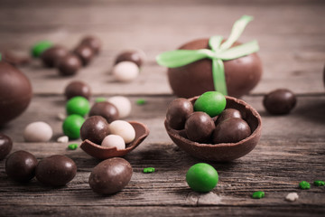 Chocolate Easter Eggs Over Wooden Background