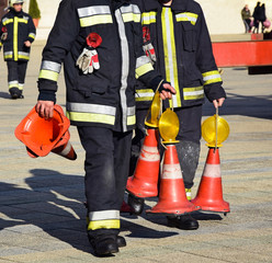 Firefighter with traffic cones