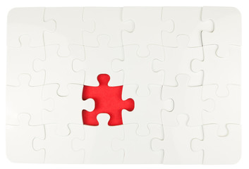 p!&egrave;ce manquante rouge d'un puzzle blanc
