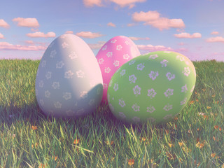 easter eggs and daisies in the grass