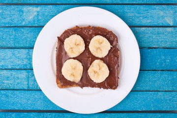 bread with chocolate spread and banana